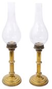 A pair of travelling candle lamps