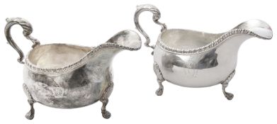 A pair of early George III silver sauce boats