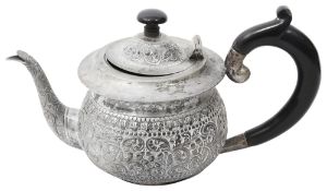 An early 20th century Indian colonial silver teapot stamped sterling silver