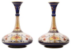 A pair of William Moorcroft for James MacIntyre Aurelian Ware vases