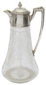 A Victorian silver mounted engraved claret jug