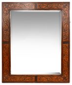 A William and Mary style seaweed marquetry inlaid fruitwood mirror