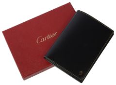 A Cartier black leather cased passport holder