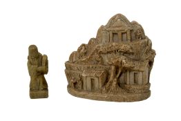 A Chinese carved soapstone mountain and a figural seal