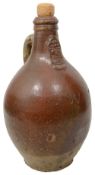 A 17th century Rhenish saltglaze stoneware bellarmine