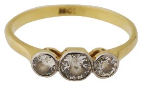 A graduated diamond three stone ring