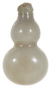 A 19th century Chinese pale celadon jade double gourd snuff bottle
