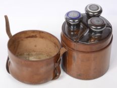 Asprey. Victorian cased picnic set of three silver and enamel topped spirit flasks