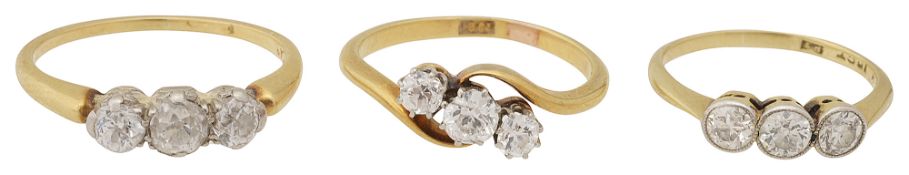 Three three-stone diamond rings