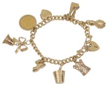 A 9ct charm bracelet with an Edward VII half sovereign