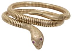 A gold articulated Victorian style snake bangle