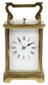 An early 20th century French lacquered brass repeating carriage clock