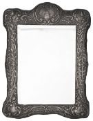 An Edwardian silver framed dressing table mirror