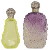 A Victorian silver mounted unranium glass scent bottle and another