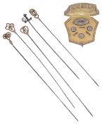 Four Edwardian 9ct gold hat pins and a cased guilloche enamel dress button and brooch set