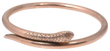 A yellow gold hollow snake's head bangle