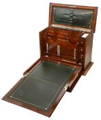 An Edwardian oak table top stationary cabinet