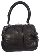 A Prada leather frame handbag