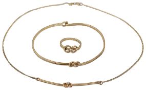 A 9ct parure comprising necklace, bracelet and ring