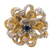 A gem-set and two coloured wirework ring