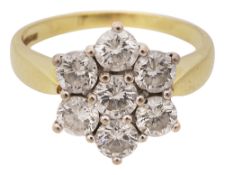 A diamond seven stone ring