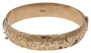 A 9ct gold stiff bangle