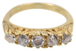 A diamond five stone ring