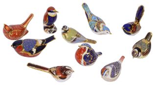 A collection of ten Royal Crown Derby paperweights