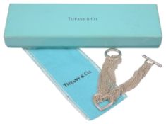 A Tiffany silver open heart and multi chain bracelet