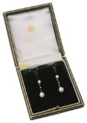 A pair of cultured pearl and diamond ear pendants