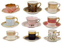 A collection of nine demi tasse coffee cups and saucers