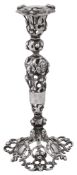 An early Victorian cast silver taperstick