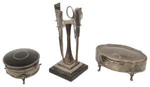 A George V silver box, a silver and tortoiseshell trinket box and a silver Art Deco manicure set on