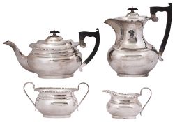A modern four piece silver service