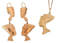 A Continental pendant in the form of Nerfetiti and a similar pair of earrings
