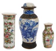 Two late 19th century Chinese Canton famille rose vases and a crackle glaze baluster vase and cover