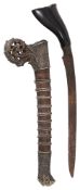 A late 19th century Malayan silver hilted dagger (Bade Bade)