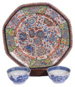 A Chinese 'clobbered' octagonal charger, together with two Chinese blue and white tea bowls