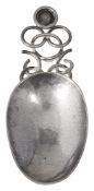 An Edwardian Arts & Crafts silver caddy spoon