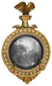 A Regency giltwood and gesso convex mirror