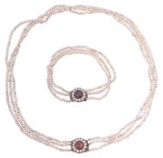 A late 18th/ early 19th century simulated pearl three strand necklace and bracelet