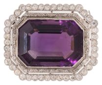 An impressive amethyst and diamond-set brooch