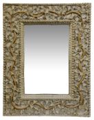 An Indian carved wood mirror