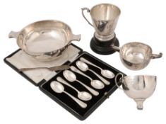 A George V presentation silver quaich, cased sets of coffee spoons and cake forks, a christening cup