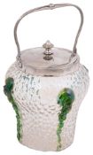 Wilhelm Kralik. An Austrian Art Nouveau electroplated mounted 'Martele' iridescent glass biscuit jar