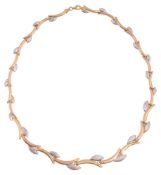 A three coloured link necklace