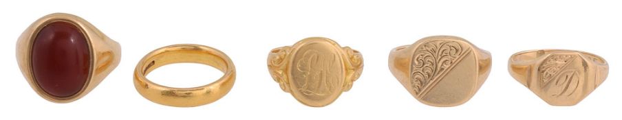 A 22ct gold ring, an 18ct gold ring and three 9ct gold rings