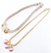 PAIR OF SILVER PENDANT NECKLACES