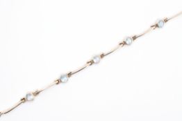 9CT GOLD & AQUAMARINE LINE BRACELET