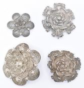 FOUR SILVER FILIGREE FLOWER PENDANTS